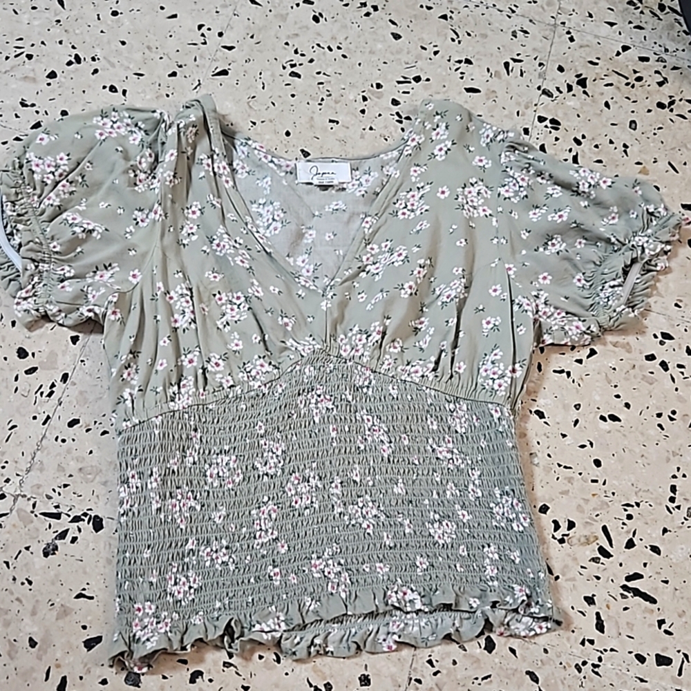 A v-neck floral printed top